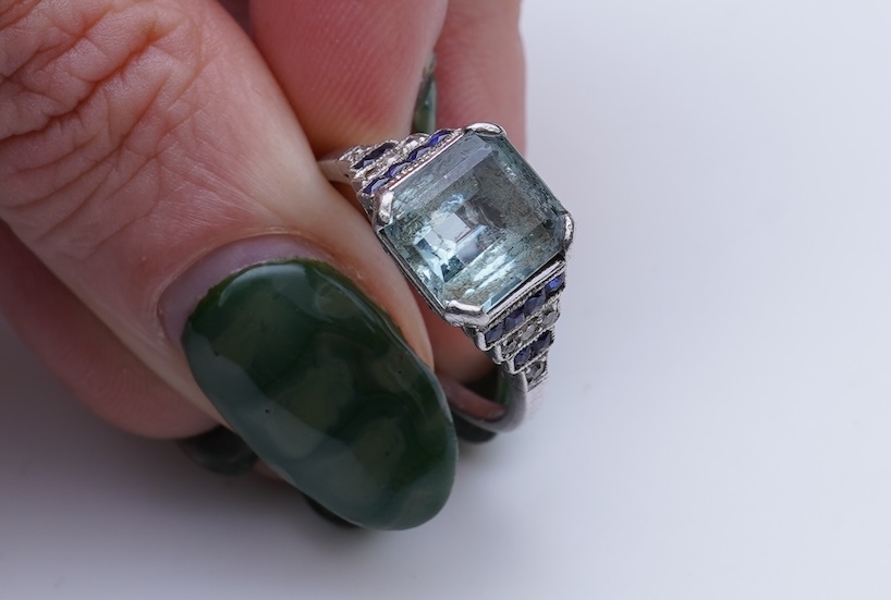An aquamarine, sapphire and diamond ring